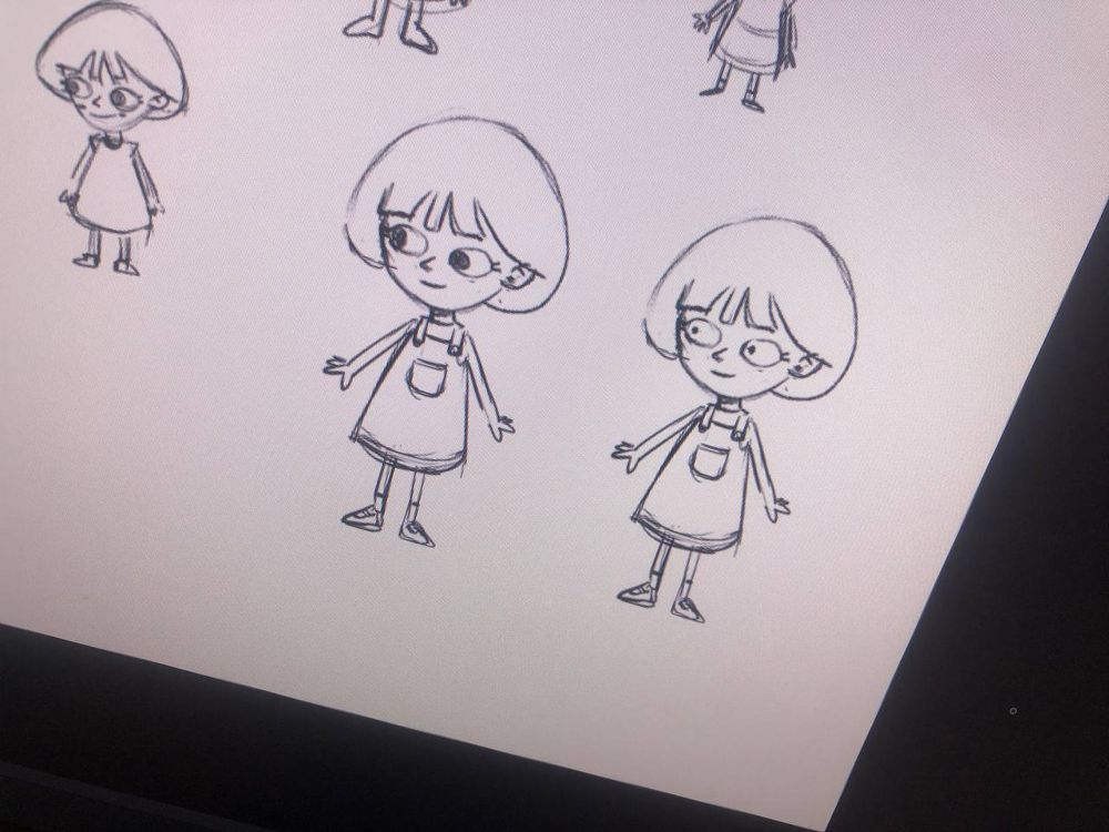 Pencil sketch studies of Riley in overalls